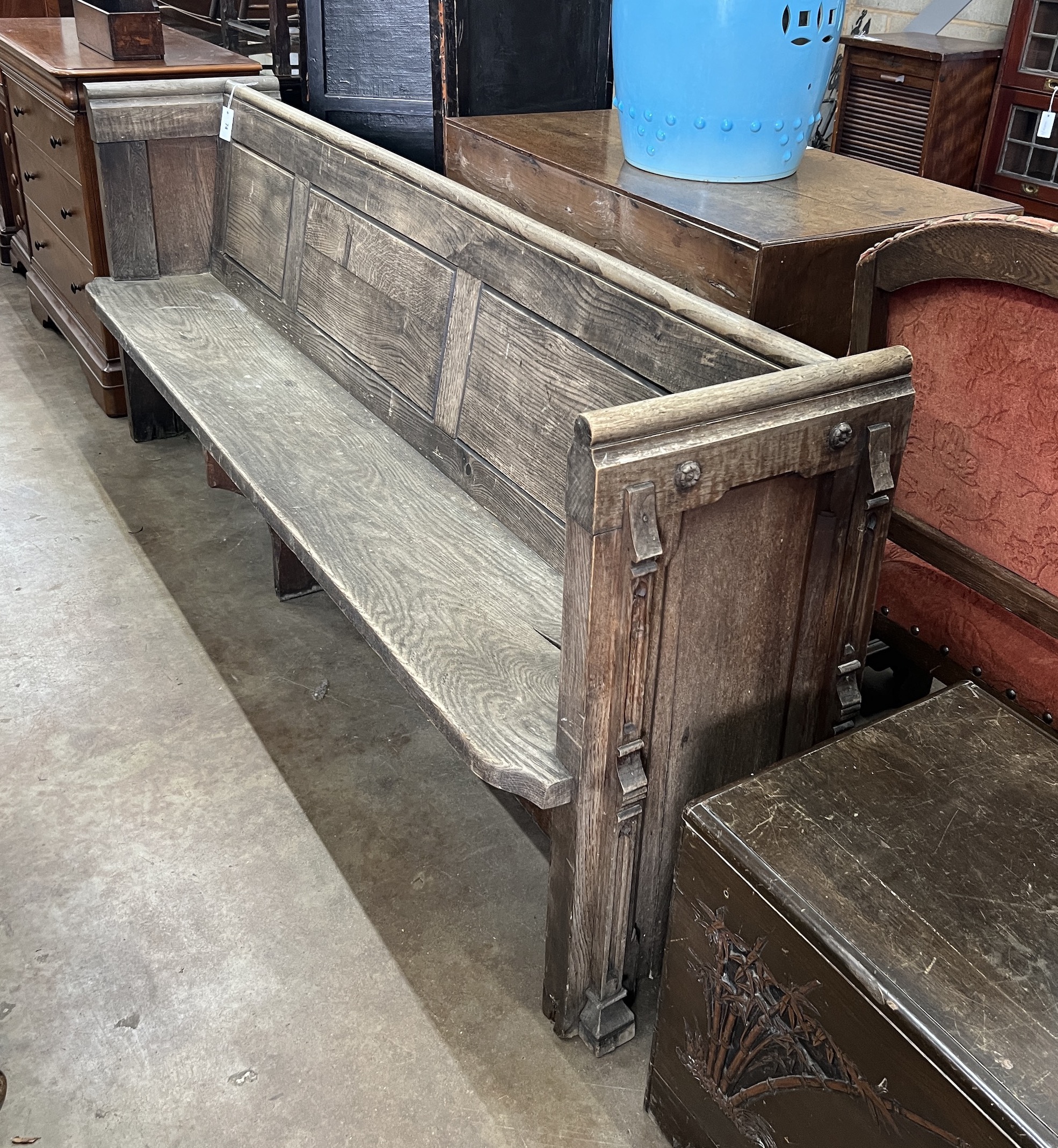 A Victorian oak pew, width 215cm, depth 45cm, height 86cm